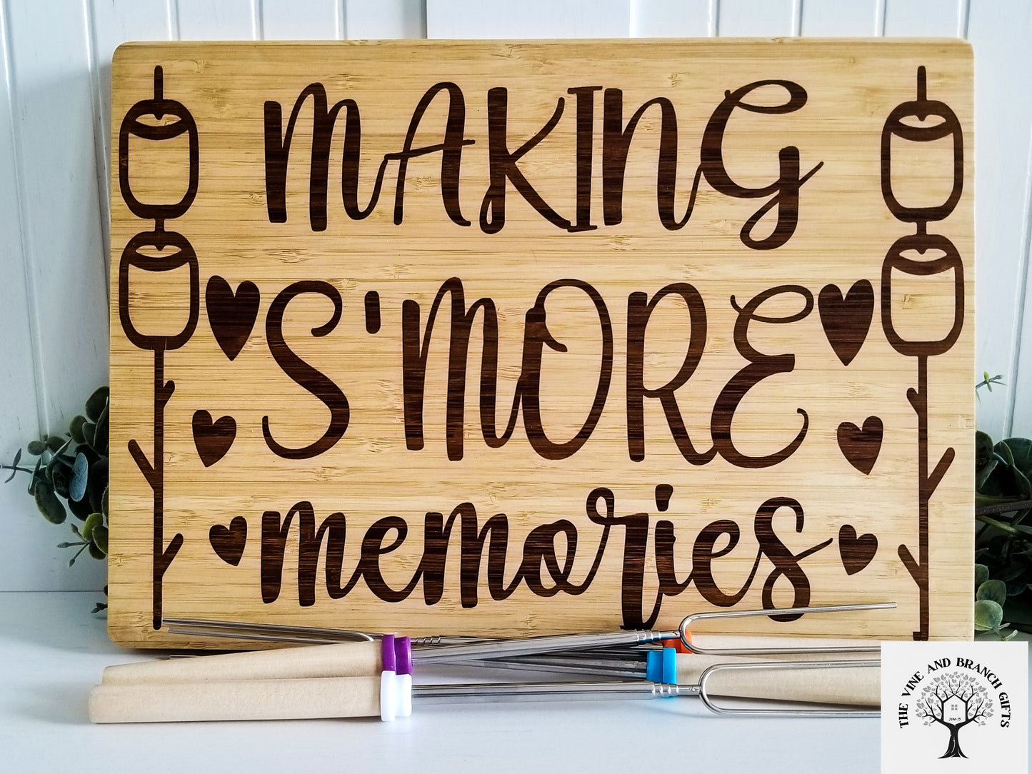 Bamboo S'mores board with 4 forks for marshmallows.  Bamboo wood laser engraved cutting board.