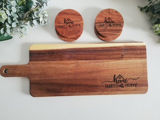 Acacia Wood Cutting Board with set of 4 round matching coasters.  Home Sweet Home Acacia wooden engraved cutting board with 4 coasters.