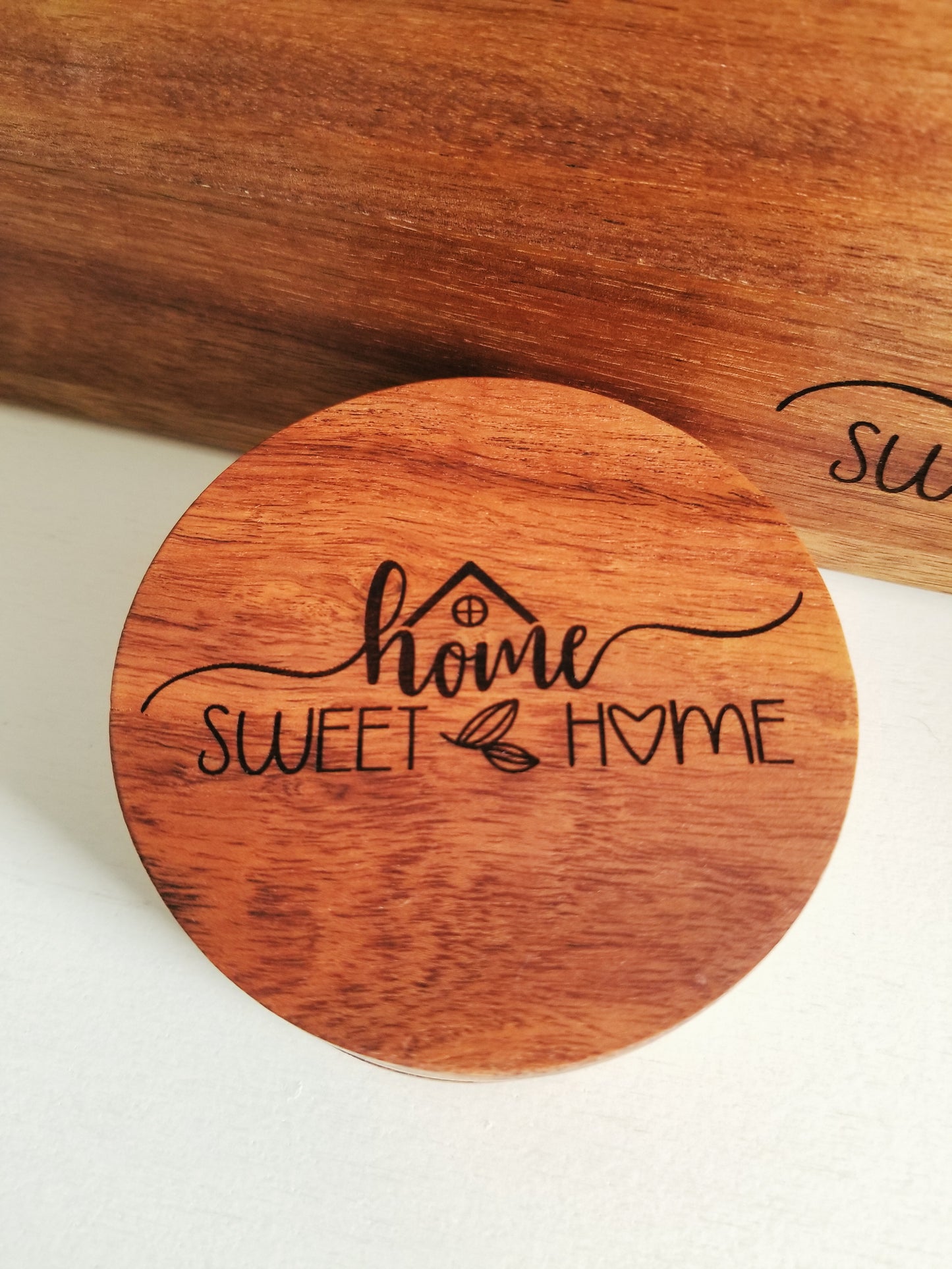 Acacia Wood Cutting Board with set of 4 round matching coasters.  Home Sweet Home Acacia wooden engraved cutting board with 4 coasters.