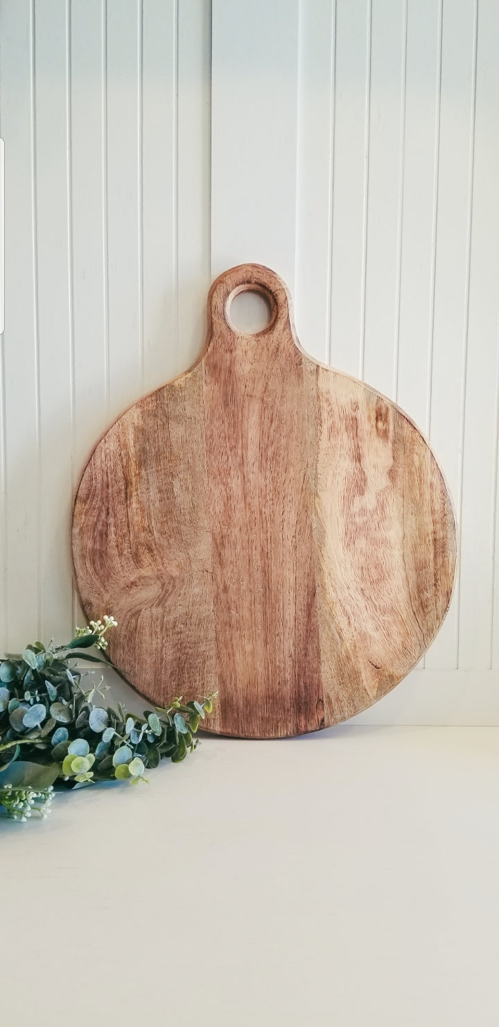 Handcrafted  Mango Wood Round Chopping Board with Handle.