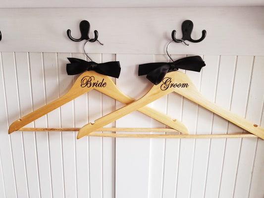 Set of 2 Bride and Groom Hangers. Hangers for the Bride and Groom. Wedding hangers. Engraved wooden hangers.